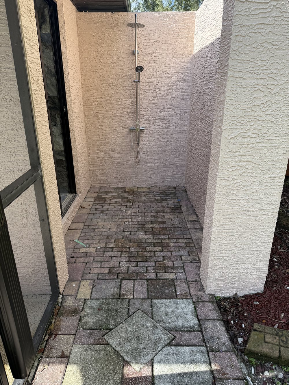 Before: weathered pavers