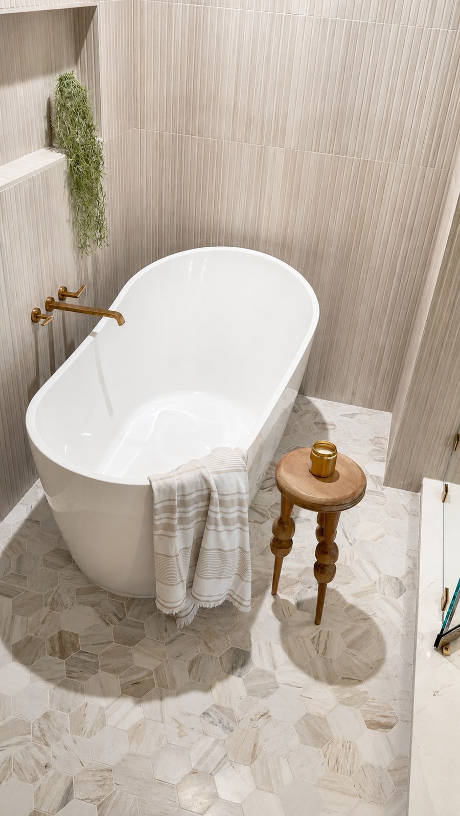 Freestanding tub with marble hex floor